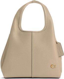 Сумка на плечо Lana из полированной галечной кожи 23 Coach, слоновая кость 9936504 | ivory