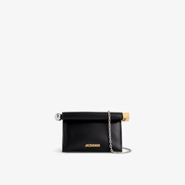 Кожаный клатч la petite pochette rond Jacquemus, черный r04253852 | black