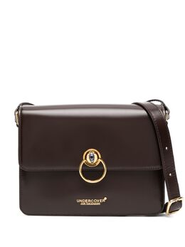 Undercover eyebuckeld cross body bag 26451823