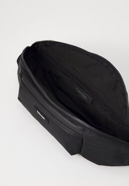 Поясная сумка ESSENTIAL WAISTBAG UNISEX Calvin Klein, черный 6ca54h0dk-q11 | black