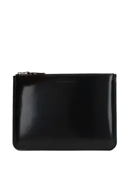 Comme des Garçons logo-debossed leather clutch bag 11583339