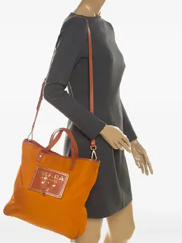 Prada laser-cut logo tote bag 30317368