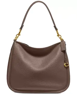 Сумка Cary из мягкой кожи Pebble с откидными ремнями Coach, коричневый 14725307 | dark stone