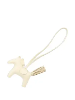 Hermes 2024 Rodeo PM Kure bag charm, off-white lambskin horse design fringe tail detail saddle leather strap - Article: 31503139