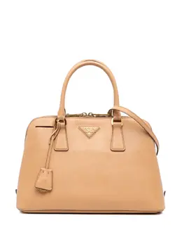 Prada Medium Saffiano Lux Promenade satchel (31720654) body rolled leather handles detachable adjustable shoulder strap top zip closure interior zips slip pockets brown charm