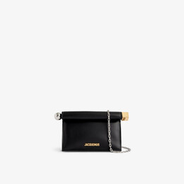 Кожаный клатч la petite pochette rond Jacquemus, черный r04253852 | black