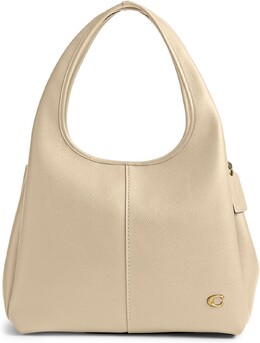 Сумка на плечо Lana из полированной галечной кожи Coach, слоновая кость 9936503 | ivory